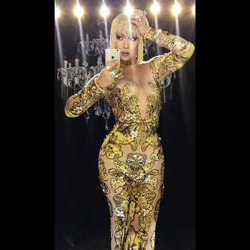 Seksi i luksuzni zlatni gol gorski kristal nalik na kombinezon bar noćni klub koncert pjevačica i plesačica odijelo.